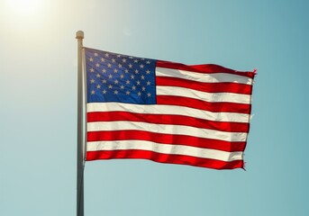 Obraz premium Waving American flag against a serene sky, patriotic symbol illuminated