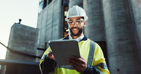 Tablet, architect and happy man outdoor for construction, low angle or planning at dawn. Technology, building and engineer in city for maintenance, safety inspection or industrial development project