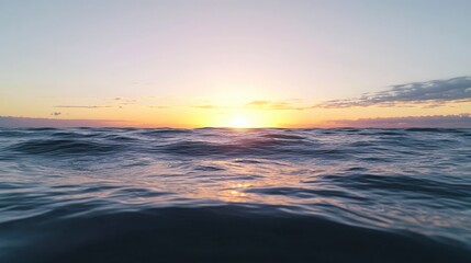 Serene Ocean Sunset Golden Hour Light on Calm Waves