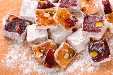 Sweet food Turkish delight, assorted rahat locum in form of cubes with nuts and powdered sugar, traditional food