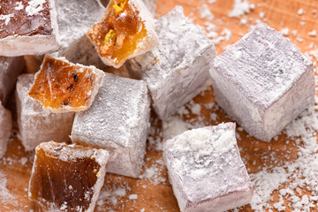 Sweet food Turkish delight, assorted rahat locum in form of cubes with nuts and powdered sugar, traditional food