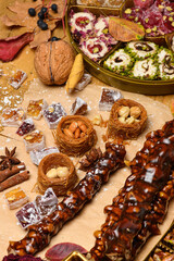 Fototapeta premium Sweet food Turkish delight on wooden background, assorted locum and candy for decorated backdrop