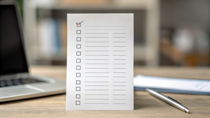 Obraz premium blank checklist on wooden desk symbolizes importance of work life balance, helping individuals stay organized and focused