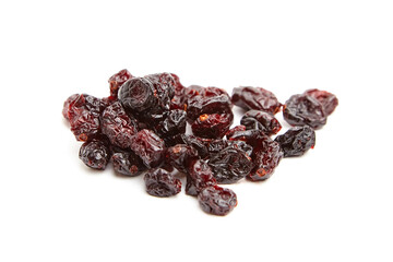 Scattered pile of dried cranberries showcasing glossy, wrinkled textures and deep red hues, isolated on a white background