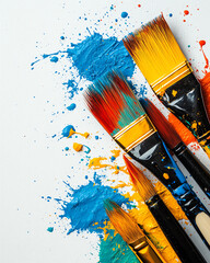Obraz premium A vibrant collection of artist paintbrushes arranged with colorful splashes of paint, showcasing creativity and art.