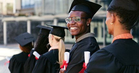 Graduate, ceremony or portrait of happy man at university for education goal, school or success. Queue, graduation or confident student in line at campus with knowledge, smile or college achievement