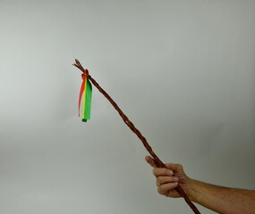 Traditional Czech Easter whip with colored ribbons 
from willow branches in my hand