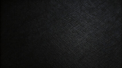 Dark, textured black leather and fabric material blend into a rough, vintage backdrop