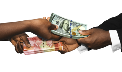 Two black african people hands holding exchanging stacks of Indonesia rupiah USA dollar currrency notes on transparent background.  pairing, Weighing  and comparing two country monies. Exchange rate 