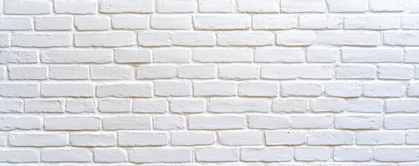 Fototapeta premium A textured white brick wall creates a clean, minimalist backdrop, ideal for various design and decor applications.