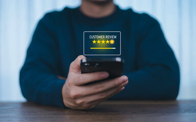 Businesspeople rate their satisfaction and praise the products and excellent service, customer care of employees. to express opinions and give 5 star ratings through the mobile app	