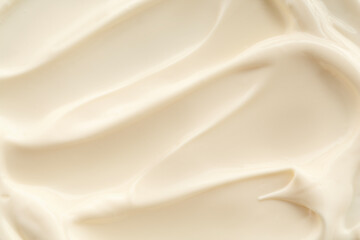 Delicious mayonnaise sauce as background, closeup view
