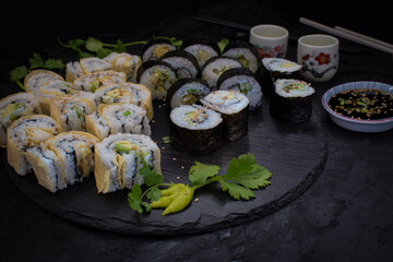 Cucumber and avocado sushi rolled in seaweed and yuba skins