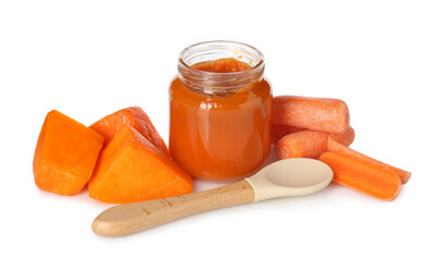 Baby food. Tasty puree in jar, spoon and ingredients on white background