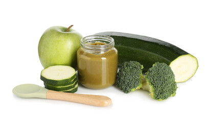 Baby food. Tasty puree in jar, spoon and ingredients on white background