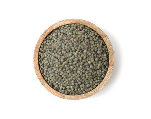 Green lentils in bowl isolated on white, top view