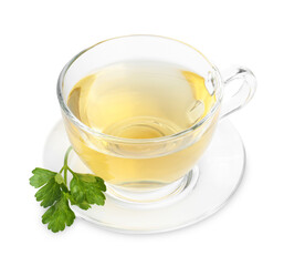 Aromatic herbal tea in glass cup and fresh parsley on white background