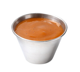 Tasty curry sauce in metal dish isolated on white