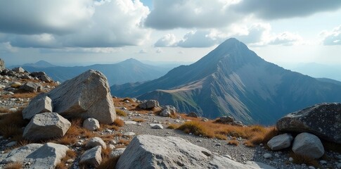 Rocky plateau with rugged peaks and valleys under overcast sky with scattered clouds, peak, rock, plateau