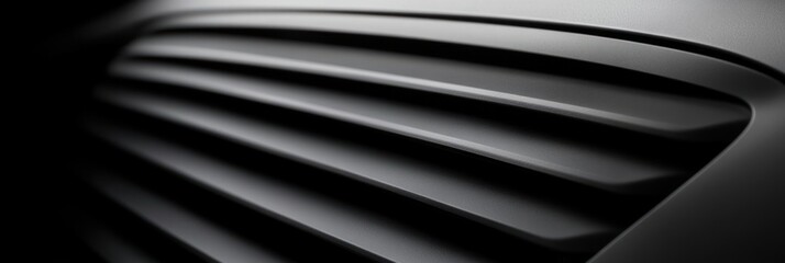 Elegant ventilation system texture featuring smooth lines and dark tones