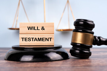 Judge's gavel and stick with the word WILL AND TESTAMENT. Justice concept