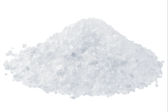Natural sea salt piled on a clean surface ready for culinary use in cooking or seasoning meals