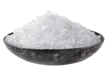 Sea salt in a decorative bowl on a neutral background for culinary use or decoration