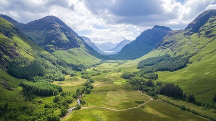 Fototapeta premium Breathtaking aerial shot of Glencoe, highlighting its rugged terrain and serene natural beauty