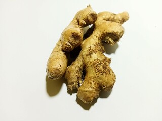 close up view of ginger on white background
