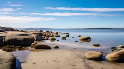 Tranquil Coastal Scene With Smooth Rocks and Calm Water