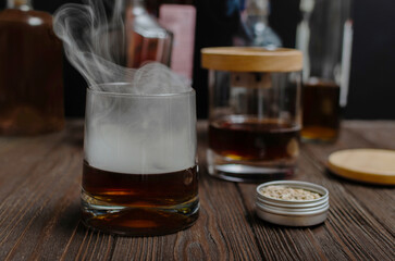 Smoked Whiskey Cocktail on Rustic Wooden Table