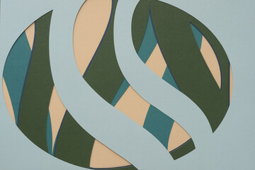 machine-cut paper oval with wavy stripes on beige