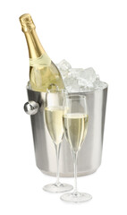 Champagne in glasses and ice bucket with bottle isolated on white