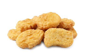 Many tasty chicken nuggets isolated on white