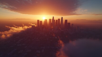 Los Angeles cityscape at sunset, skyscrapers piercing through a sea of clouds.