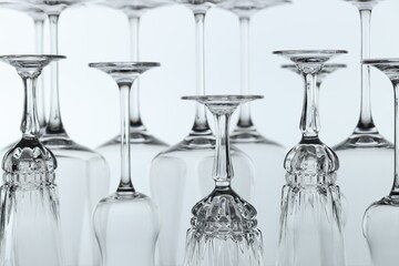 Clean glasses on light grey background, closeup