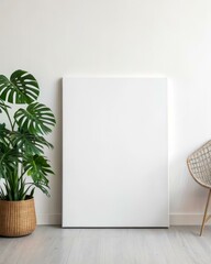 Minimalist Interior with Blank Canvas and Greenery Mockup