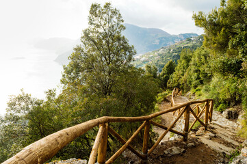 Panoramic view from hiking trail Path of Gods between coastal towns Positano and Praiano. Trekking in Lattari Mountains, Apennines, Amalfi Coast, Campania, Italy, Europe. Coastline Mediterranean Sea.