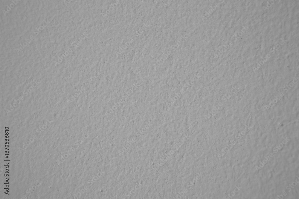Poster rough gray textured background creating a grainy surface ideal for design projects