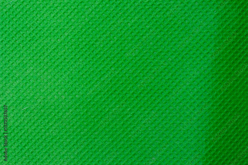 Poster green textured background forming a seamless repeatable pattern