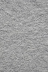 White handmade paper background texture with silver glitter