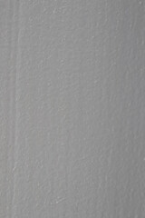 Gray textured background providing ample copy space for design projects