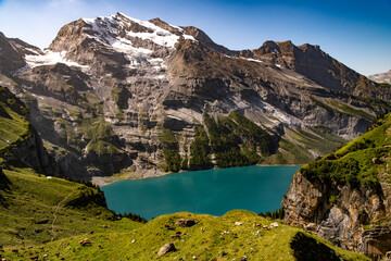 Breathtaking views of Lake Oeschinen and the mountains of the Bernese Oberland.
Oeschinen Lake is a lake in the Bernese Oberland, Switzerland, 4 kilometres east of Kandersteg in the Oeschinen valley. 
