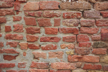 This textured brick wall is ideal for various backgrounds and design applications