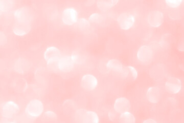Rose gold pink bokeh texture background. New Year, Christmas, Valentine, Romance, Wedding Anniversary, Love and celebration backgrounds concepts.