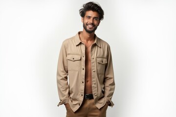 Fototapeta premium Half-Length (Waist-Up) portrait of young stylish smiling Syrian male model in hippie wear isolated on pure white background looking at camera