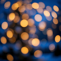 Fototapeta premium bokeh lights, golden glowing orbs, blurred background, dark blue tones,