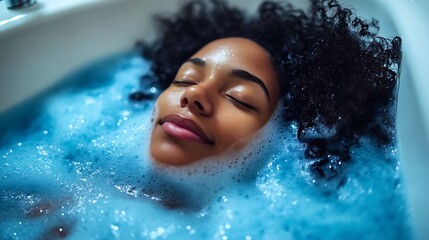 Relaxed woman enjoying a bubble bath.