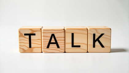 Wooden blocks spelling talk on a plain background for websites, blogs, educational materials, communication campaigns, and social awareness graphics