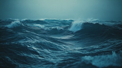 Fototapeta premium Dark blue ocean waves create dynamic patterns on the water surface